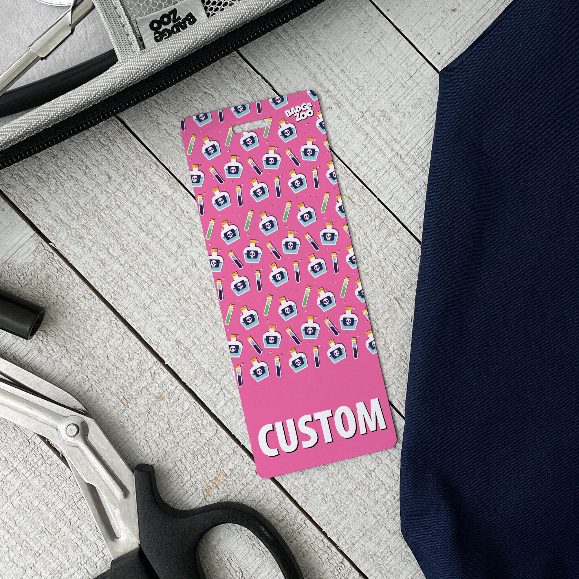 Cute pink poison bottle badge buddy lifestyle shot