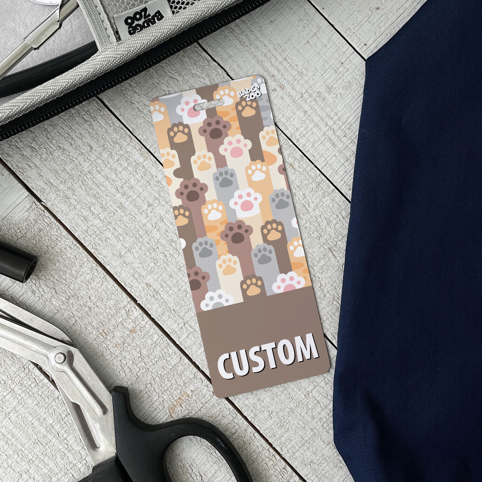 Lovely cat paws print on badge buddy