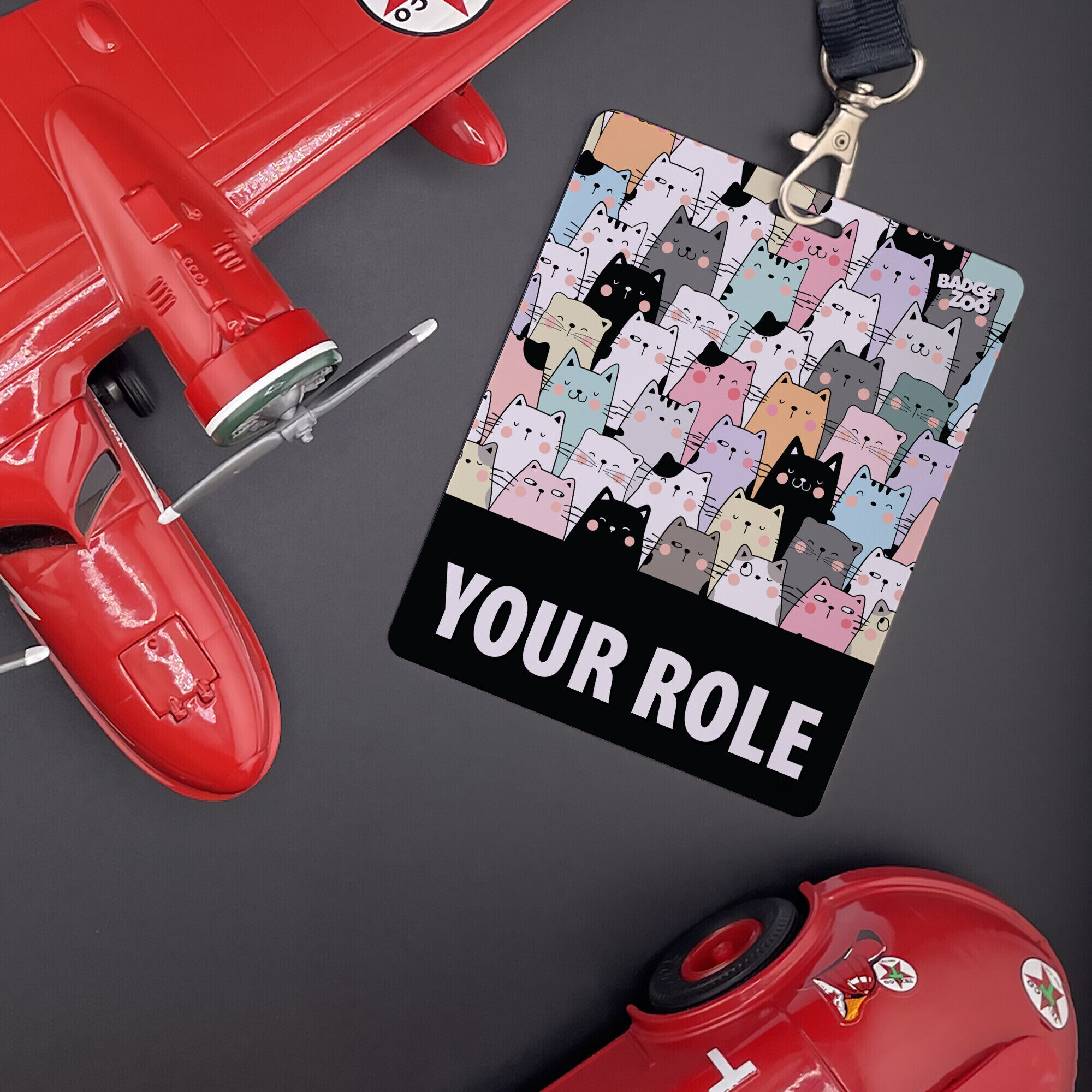 Whimsical badge buddy adorned with cute cats