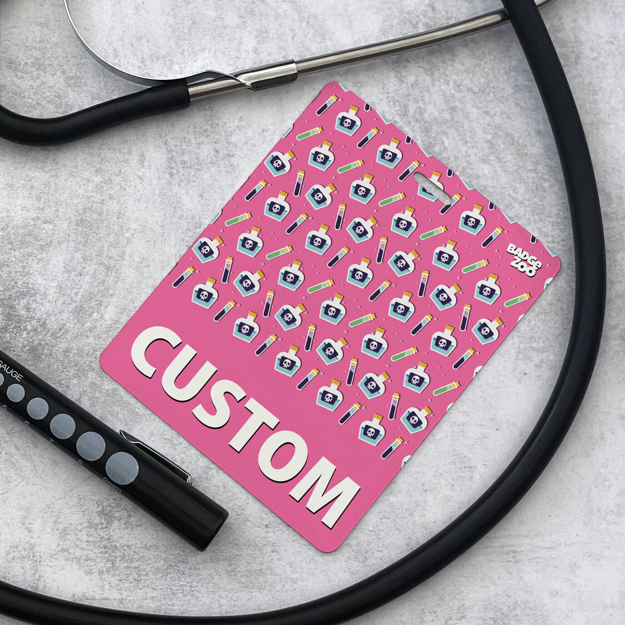 Whimsical pink poison bottle badge buddy setup