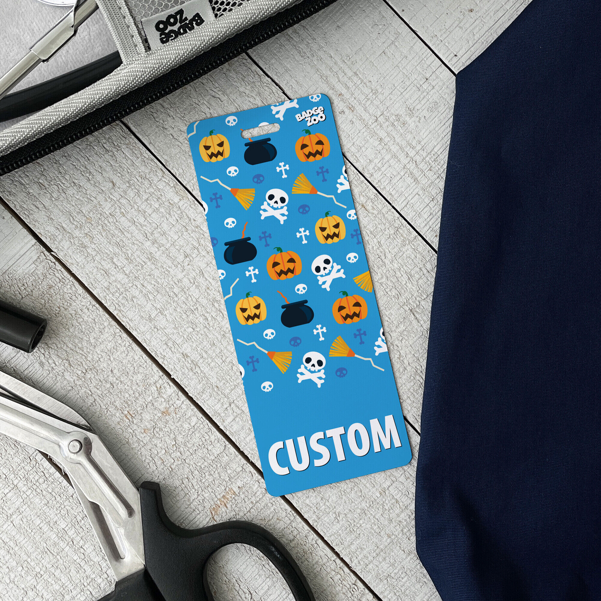 Durable Blue Pumpkins and Skulls Badge Buddy