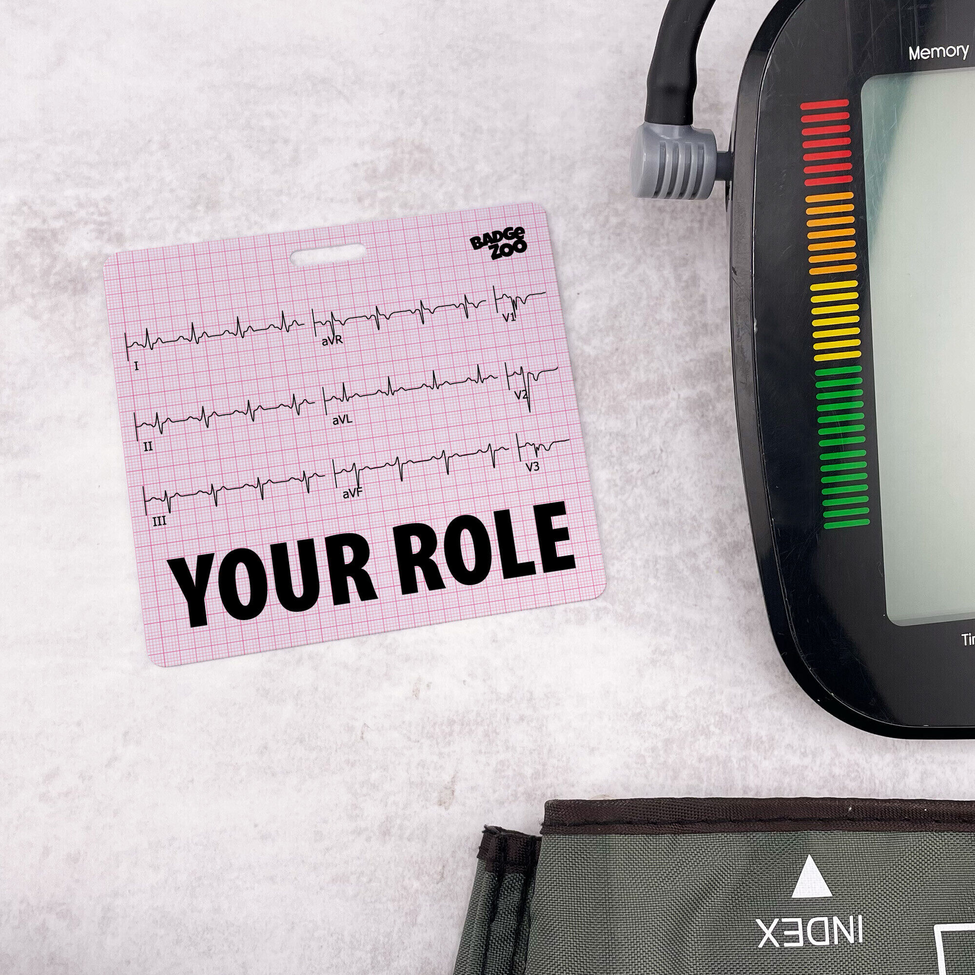 Creative design of EKG Badge Buddy in hand