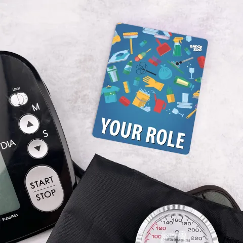 Blue cleaning-themed badge buddy with YOUR ROLE text beside blood pressure monitor and cuff