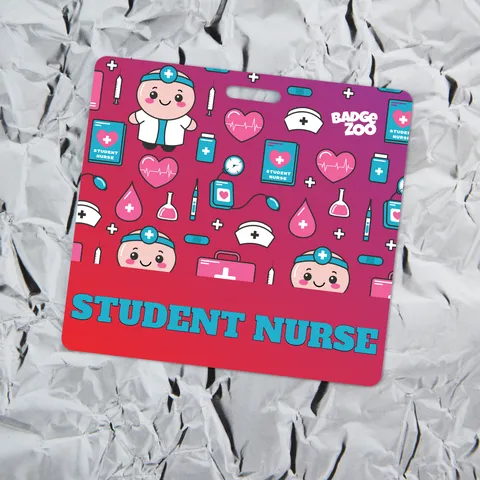 Horizontal student nurse badge buddy lying on crumpled aluminum foil