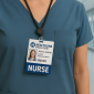 Hand holding a flexible Badge Buddy labeled "NURSE" in blue, demonstrating card durability
