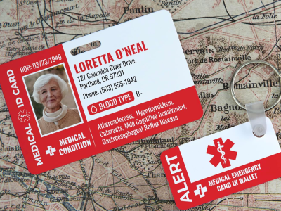 Medical ID card with photo, personal health information, and emergency keychain alert on vintage map background